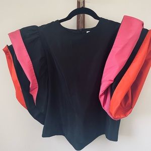 ZARA black silk top with exaggerated sleeves rolled up with hot pink and orange